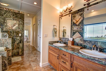 Primary bathroom with double vanity sinks