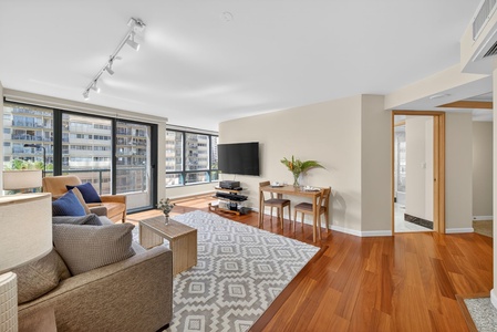 Stretch out in this bright open living space with hardwood floors and lanai access.