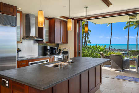 Expansive counters and gourmet appliances make meal preparation a pleasure.