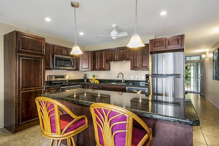 Breakfast bar in this fully equipped Kitchen