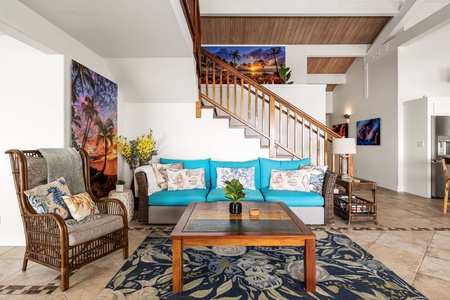 Relax into plush seating as doors open wide to the rhythm of the ocean.