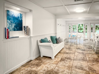 A welcoming sitting area just off the kitchen, perfect for relaxing.