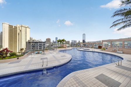 Cool off in the rooftop pool overlooking Honolulu’s skyline and swaying palms.