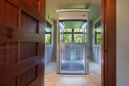 In-home elevator lift providing easy access between levels.