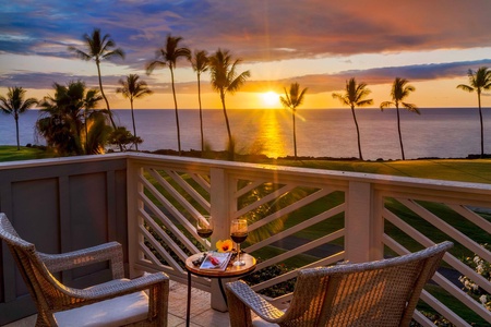 Enjoy sunset drinks with a stunning ocean view at Holua Kai #26.