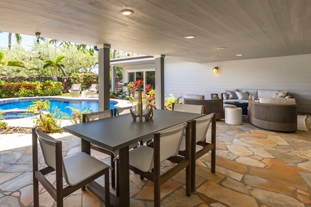 Spacious dining area with seating for eight, great for family meals or gatherings.