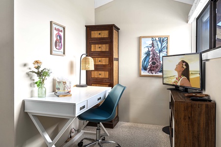 The secondary bedroom has a home office for convenient work from home arrangements