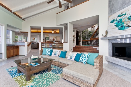 Relax in coastal elegance - your open-plan living space designed for comfort and style.