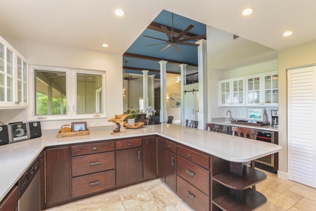 The kitchen’s open design keeps everyone connected while entertaining or cooking.