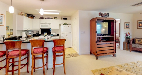Fully-stocked kitchen with ample appliances to cater your culinary needs.