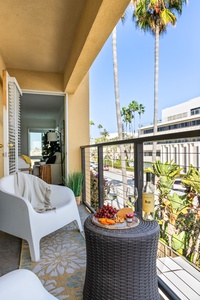 Take in the tropical vibes from your balcony lounge, the perfect spot to unwind.