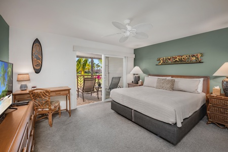 Luxurious primary suite with a private lanai, stunning ocean views, and abundant natural light.