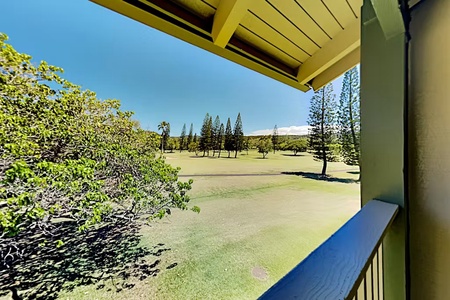Lanai view overlooking golf course and open greens.