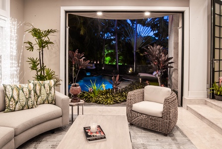 Indoor-outdoor living with tranquil views of the private yard.