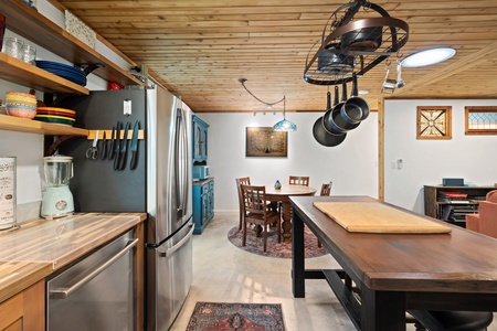 Open-concept design connects kitchen to dining, making meal prep and serving easy and social.