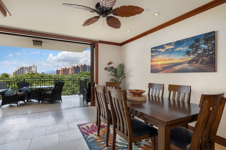 Gather around the warm wood dining table for memorable meals, with tropical breezes flowing through open doors to your private balcony.