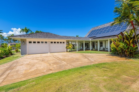 Welcome to Hokulani Villa, where ample driveway parking and lush tropical landscaping greet you upon arrival in beautiful Princeville.