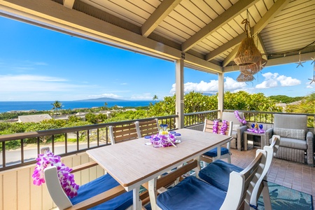 Relax on the lanai with stunning ocean views, perfect for enjoying a refreshing drink while soaking in the serene surroundings.