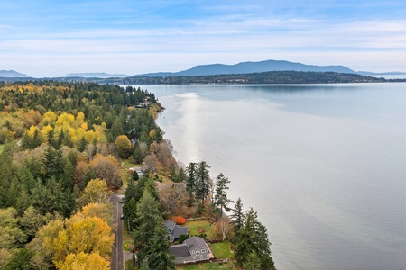 Take in the stunning blend of forest and shoreline where the Pacific Northwest truly shines—this view is your backyard.