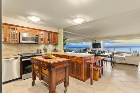 Featuring modern appliances and a prep island.