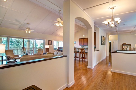 The hallway takes you to either wing of the house.  Each wing hosts 2 bedrooms.