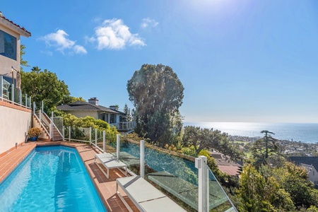 Gorgeous two-tiered tile patios with ocean views