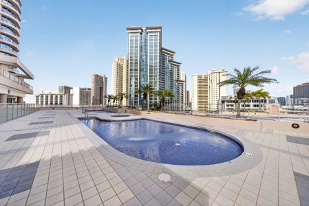 Unwind poolside with panoramic city views from Waikiki Landmark’s rooftop retreat.