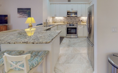 Gracious amenities and stainless steel appliances for your culinary adventures in the kitchen.