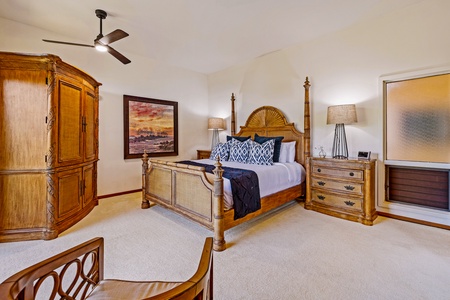 The primary suite at Kapalua Ridge 2321 features a king bed, chic decor, and calming island tones.