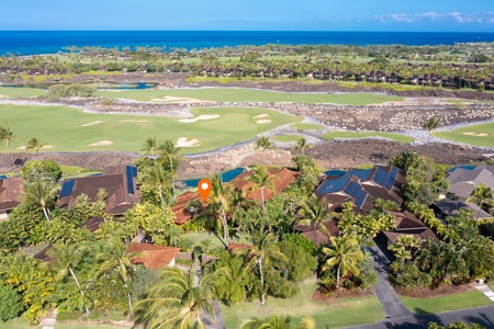 Prime apex lot framed by tropical landscaping and golf course frontage.
