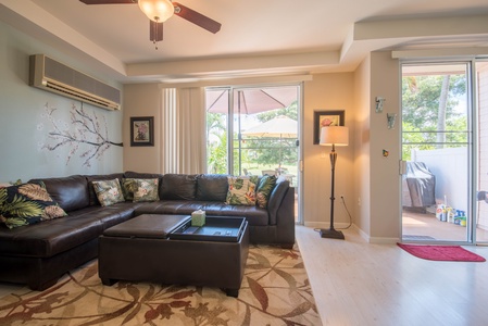 A large leather sectional compliments the home.