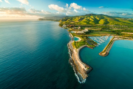 Soar above the shoreline—an aerial view reveals Ko Olina’s four postcard-perfect lagoons.