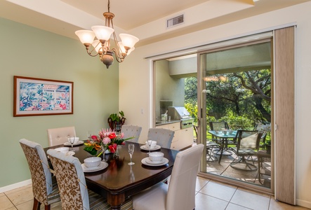 Relax in the stylish living room with flat-screen TV, plush sectional seating, and tranquil fairway-facing windows.