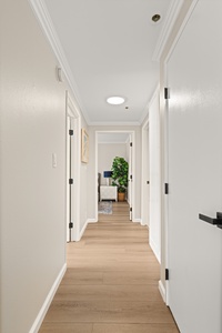 Entry hallway leading to your peaceful retreat, setting the tone for your relaxing coastal getaway.
