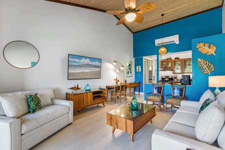 Partial ocean views and blooming plumeria await on the lanai of Napili Shores F-252.