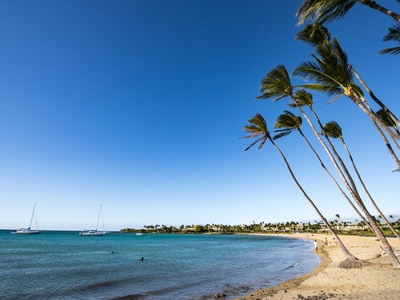 Bask in the serenity of a nearby beach with gentle surf, turquoise waters, and quiet shores just minutes from your villa.