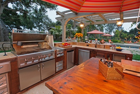 The fully-equipped outdoor kitchen is a chef's delight.