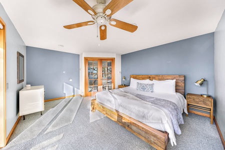 Bright and roomy primary suite with a plush king bed for your private sanctuary