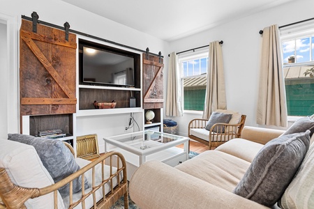This cheerful dining nook features seating for six and easy access to the kitchen—ideal for shared meals or morning coffee.