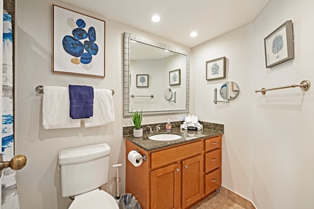 Refresh after island adventures in Kaanapali Shores 903’s modern, well-lit bathroom.