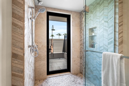 Walk-in shower with direct access to fresh air and garden views.