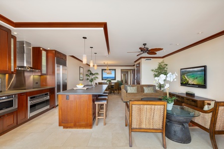 Open-concept layout flows from entry to breezy lanai.