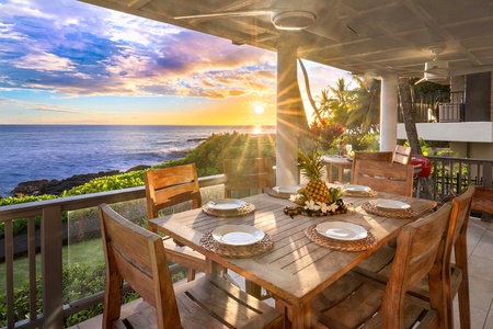 Upper-level private lanai with lounge chairs overlooking the breathtaking Kona coastline.