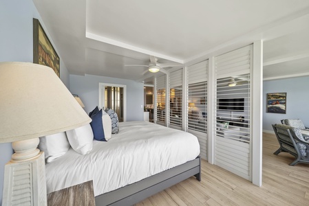 Your elegant bedroom features crisp linens and modern coastal style.