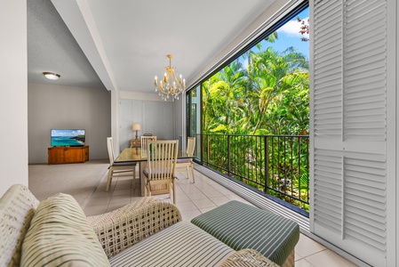 Enjoy a good book in this cozy reading nook with garden views.