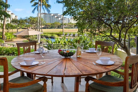 Enjoy your morning coffee on this cozy lanai.