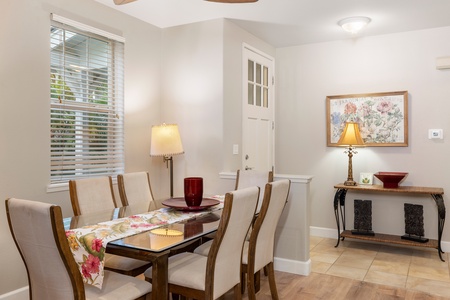 A dedicated dining area seats six, making meals easy to enjoy together—whether it’s takeout from Roy’s or a homemade poke bowl.