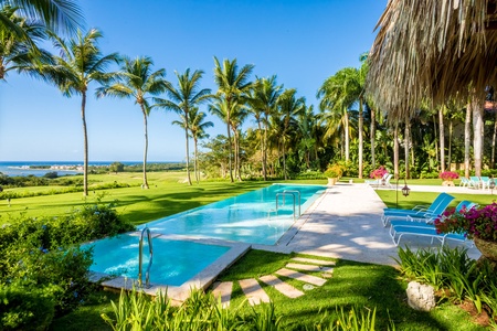 Take a refreshing dip in the pool at Villa Palmeras (Palmeras), your luxury home at La Romana, Dominican Republic.