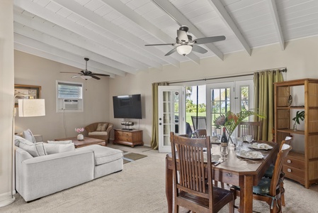 Bright and open living and dining area with seating for six.