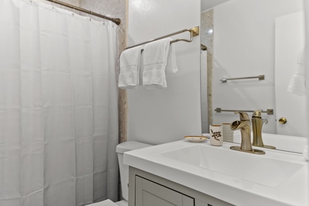Full size shower in upstairs bathroom.